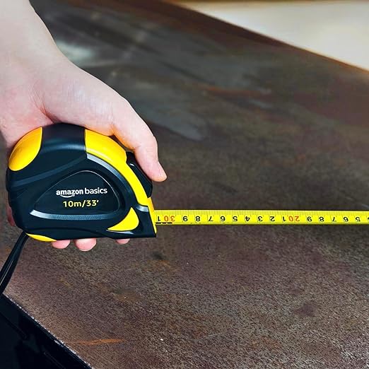 Amazon Basics Self-Locking Tape Measure with Belt Clip, 33 feet (10 m), Inch/Metric Scale, MID Accuracy, Black, Yellow